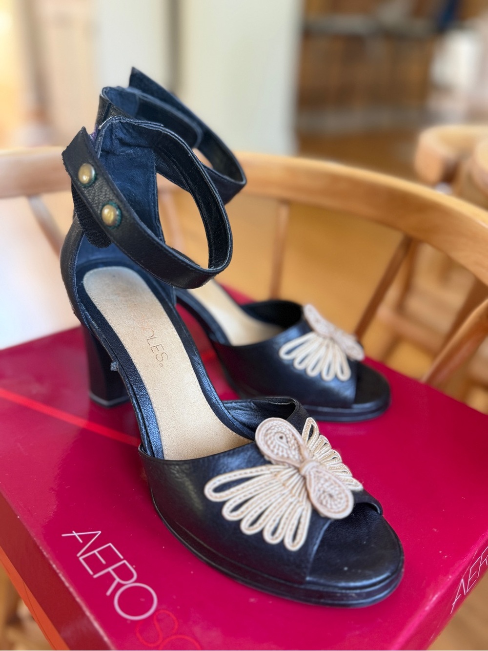 AEROSOLES Black Leather Ankle-Strap Heels with Cream Bow Accent